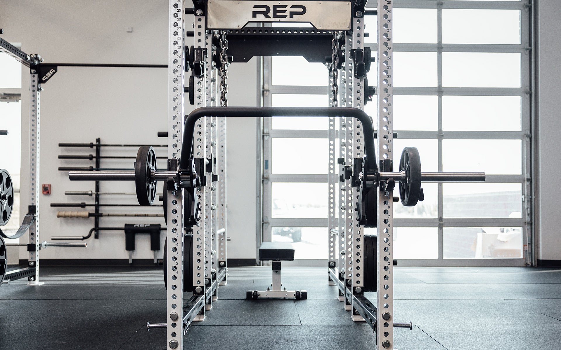 REP Open Trap Bar loaded with 25lb plates and racked in a REP PR-5000 rack.