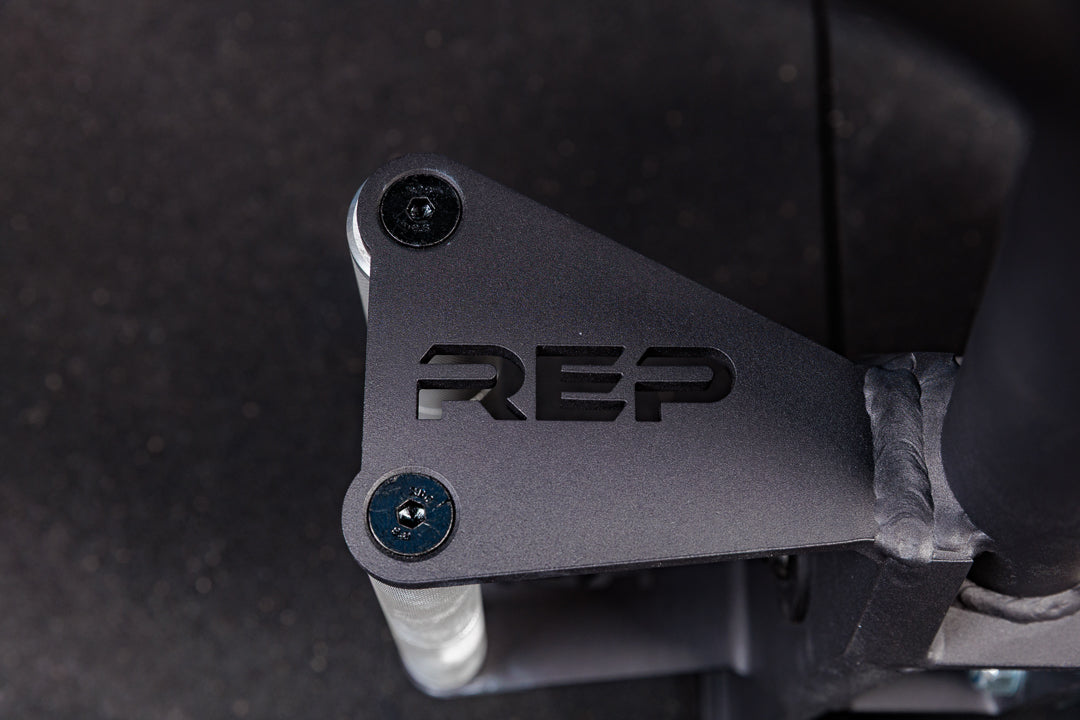 Close-up of Fixed Open Trap Bar handle with REP logo