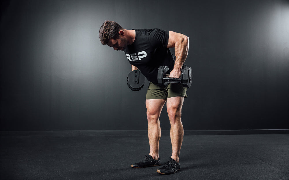 Athlete performing bent over rows with a pair of REP x PÉPIN FAST Series Adjustable Dumbbells.