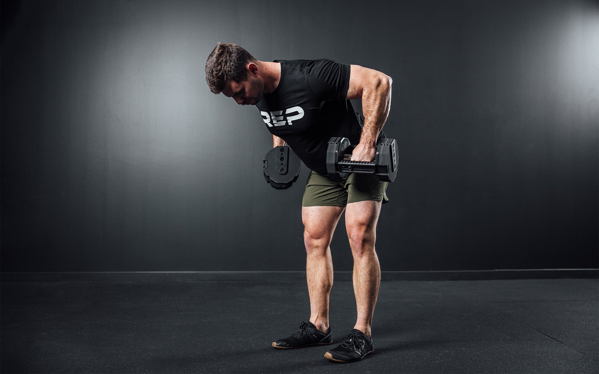 Athlete performing bent over rows with a pair of REP x PÉPIN FAST Series Adjustable Dumbbells.