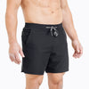 Front view of model wearing the black REP Pinnacle Shorts.