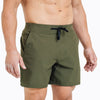 Front view of model wearing the olive REP Pinnacle Shorts.