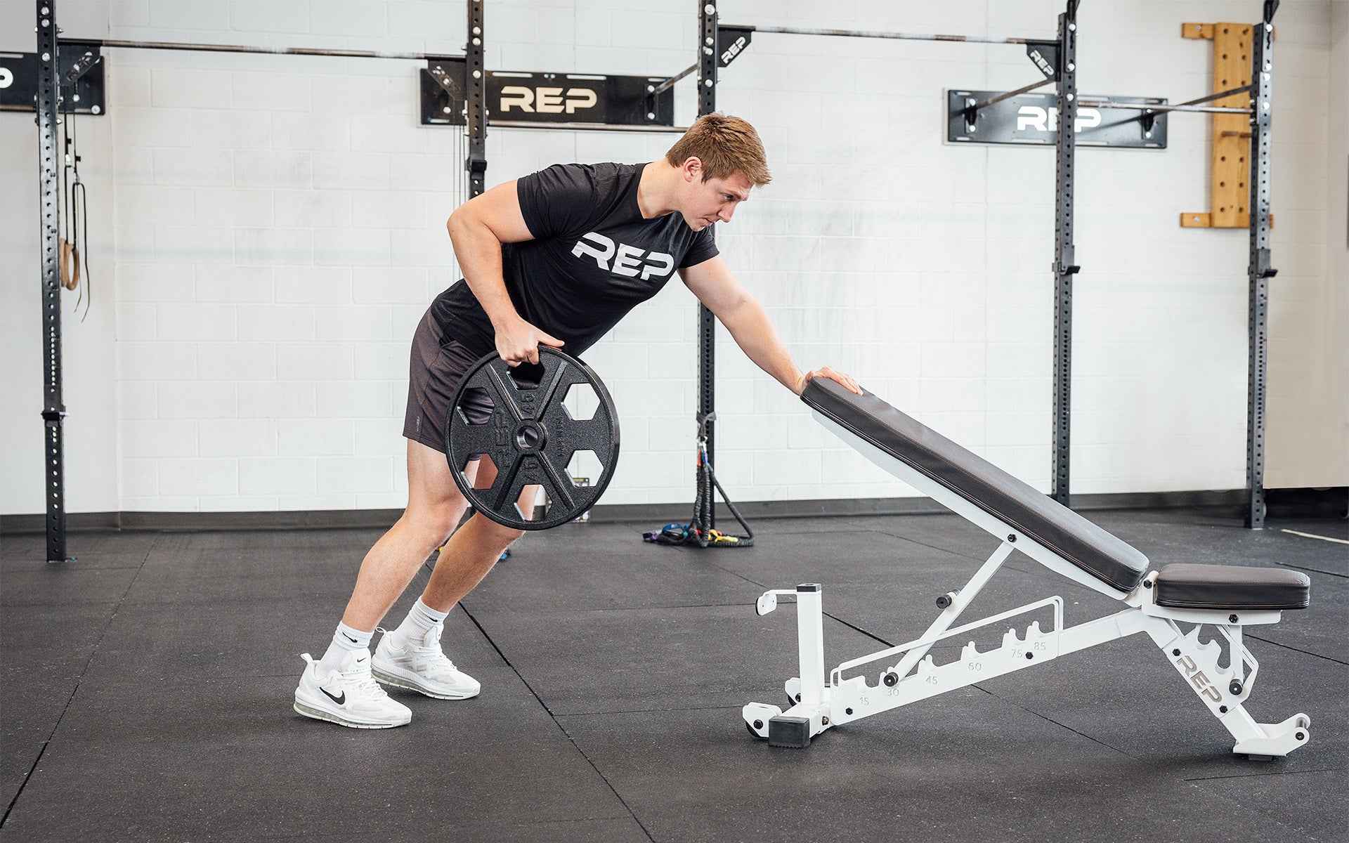 Lifter using a single 45lb USA-Made Equalizer Iron Plate for bent over row.