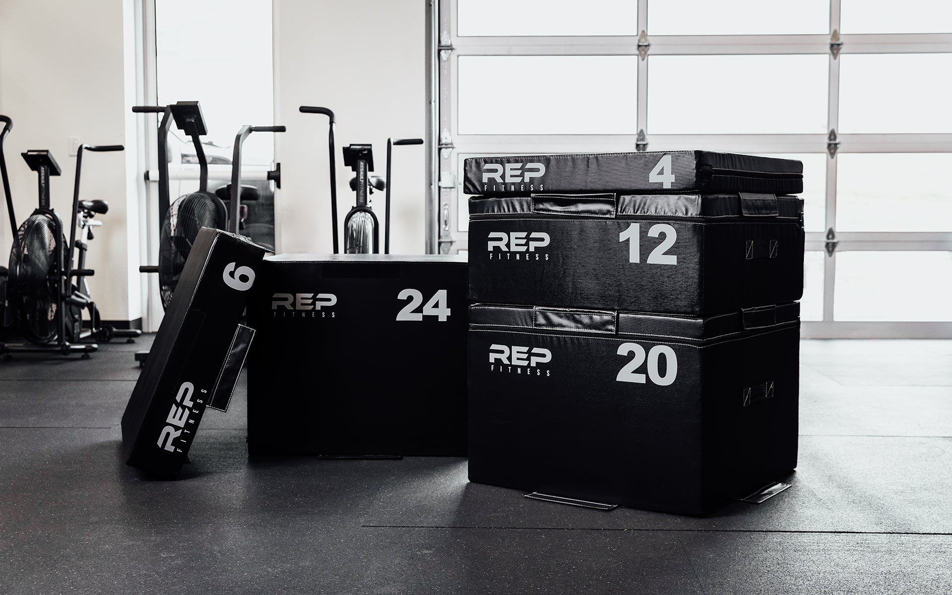 Full set of REP Stackable Soft Foam Plyo Boxes in a gym setting.
