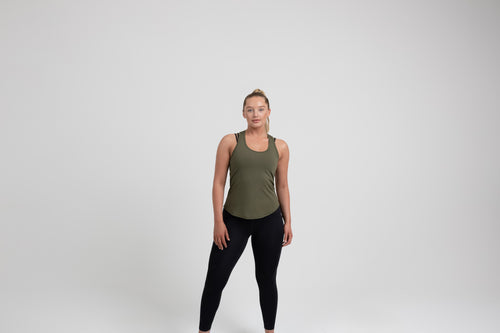 Athlete wearing an olive REP Women’s Clio Tank Top.
