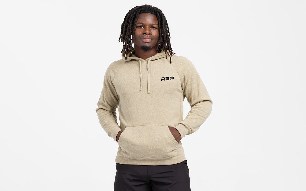 Man wearing Heather Stone Unisex USA Pull Over Hoodie