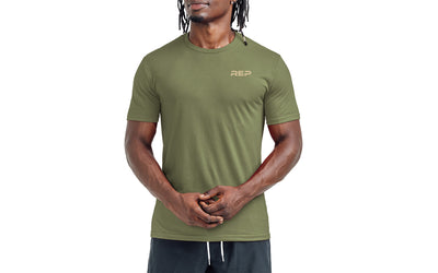 Athlete wearing the REP Fitness Men's  Engineered Tri-Blend Crew T-Shirt in Heather Olive/Tan