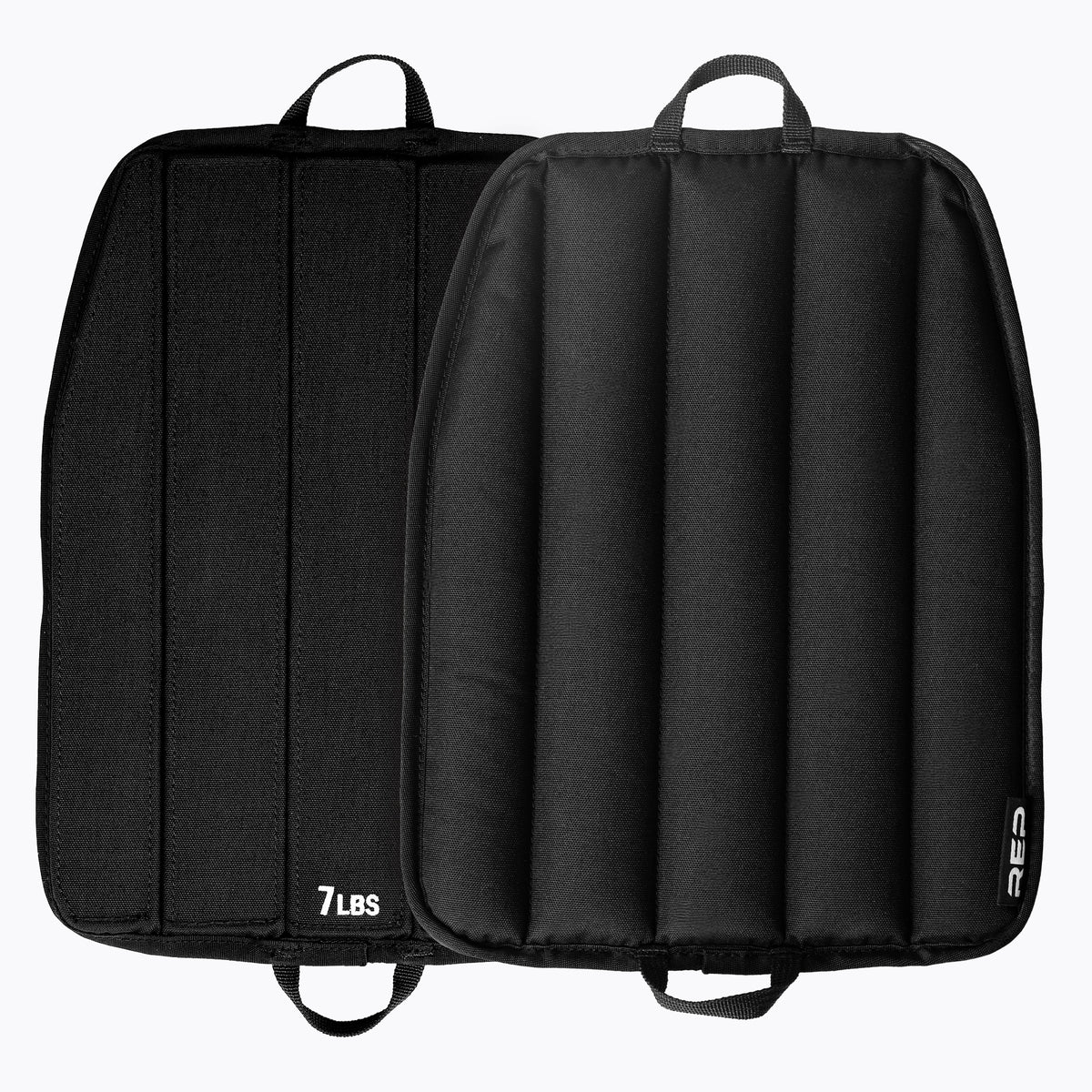 Black soft weight vest plates with a visible brand logo on a white background