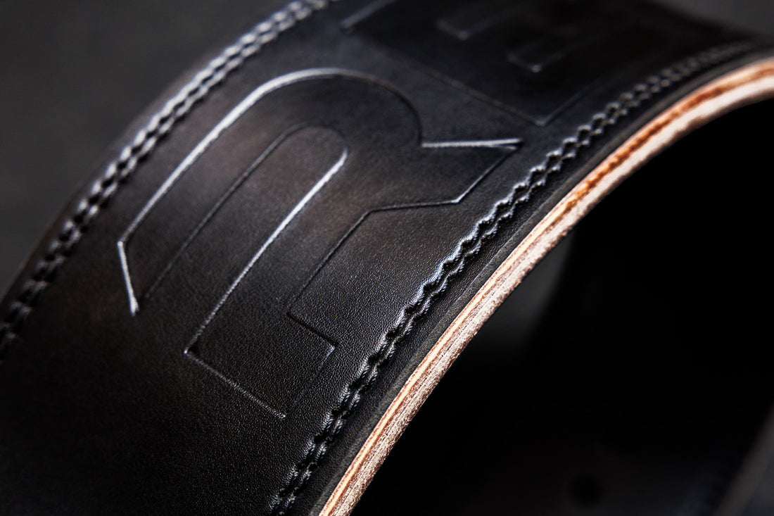 Close-Up: REP Leather Lifting Belt in Black with debossed REP branding and reinforced stitching