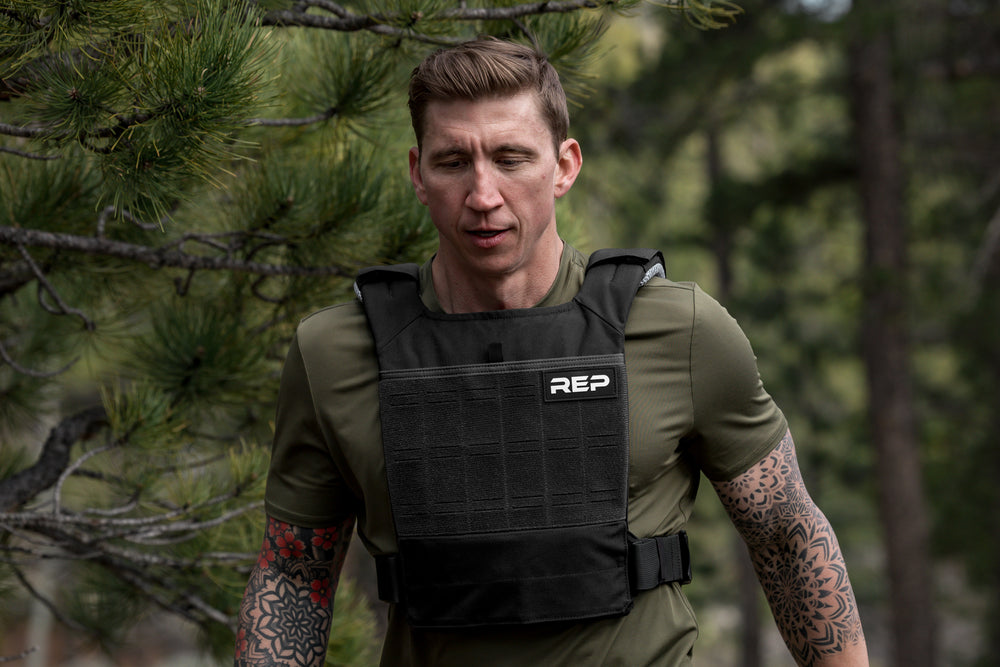 Athlete exercising in the woods with the Black Strata Weight Vest