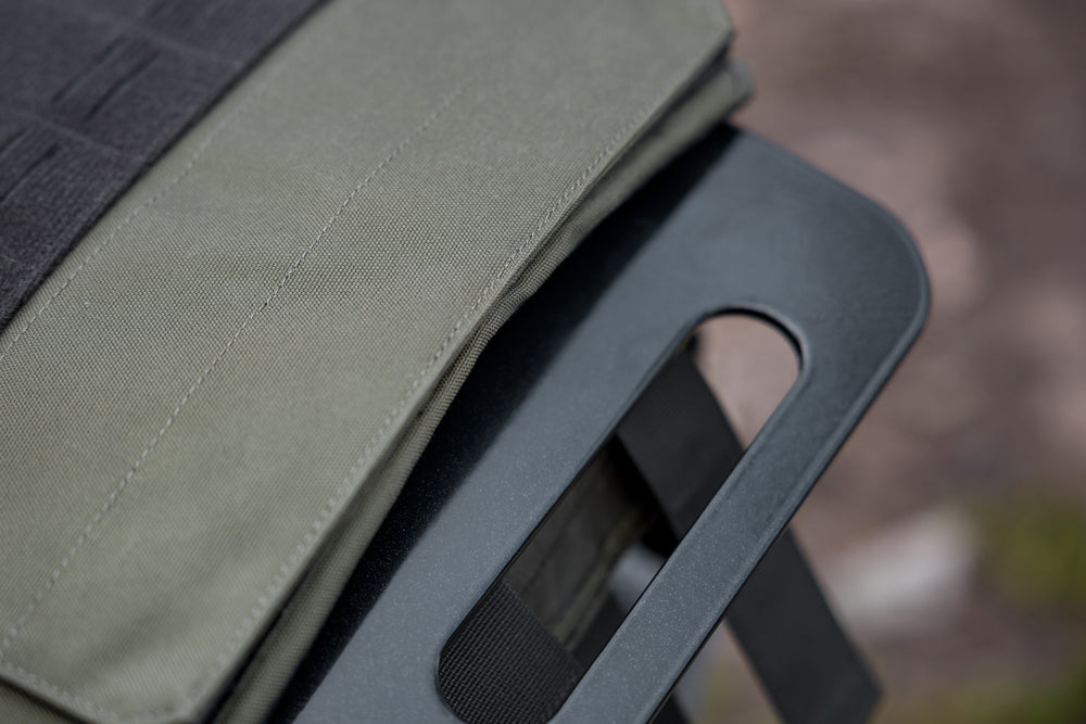 close up of the bottom handle on the Strata Weight Vest Plate