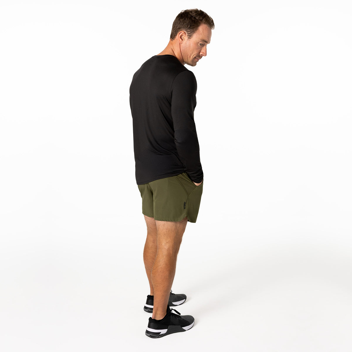 The REP Fitness Men's Delta Long Sleeve Crew T-Shirt in Heather Black side profile