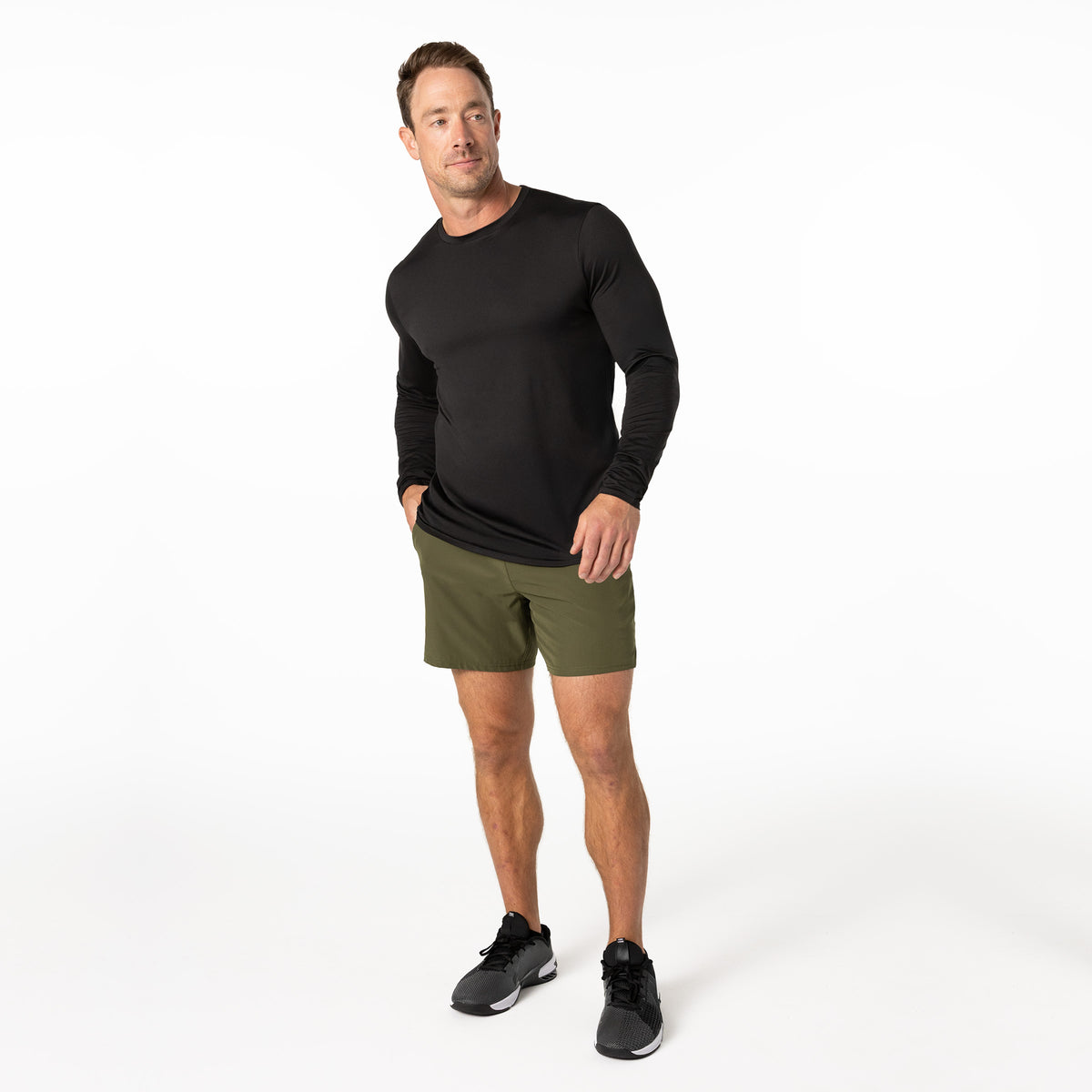 The REP Fitness Men's Delta Long Sleeve Crew T-Shirt in Heather Black lifestyle