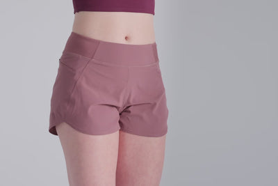 Video: Athlete posing in the studio wearing the REP Artemis Short in Mauve, Black, and Cool Gray