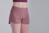 Video: Athlete posing in the studio wearing the REP Artemis Short in Mauve, Black, and Cool Gray