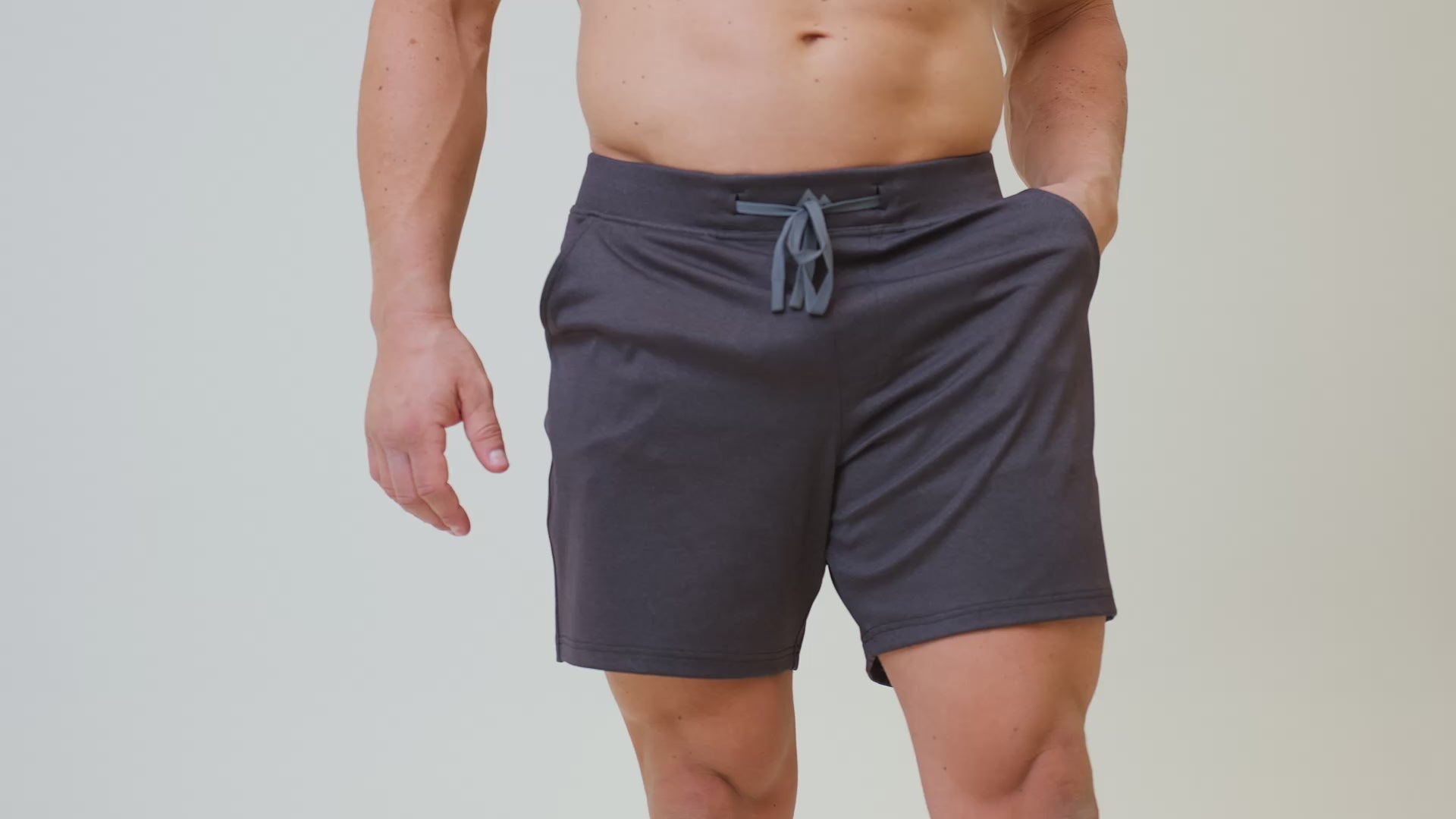 Video of a model posing and working out in REP's Versa Shorts
