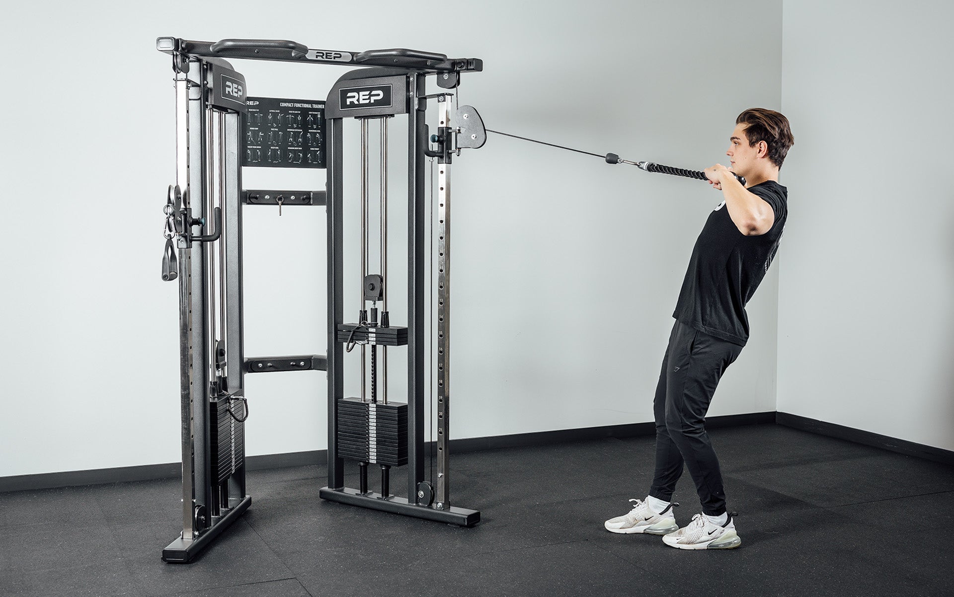 FT-3000 Compact Functional Trainer 2.0 Being Used for Cable High Row with Tricep Rope Cable Attachment