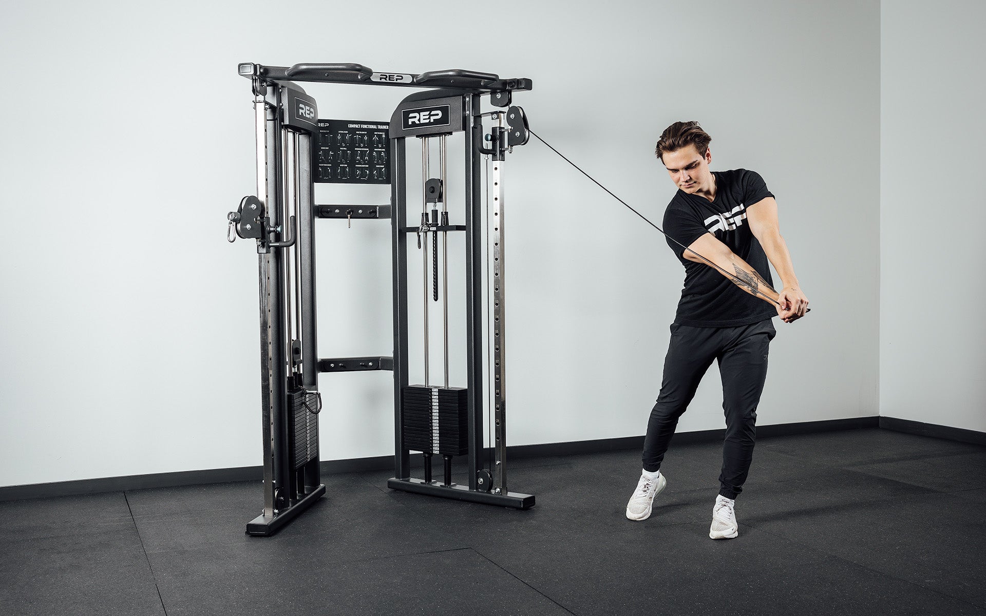 FT-3000 Compact Functional Trainer 2.0 Being Used For Wood Choppers with Sports Handle Cable Attachment