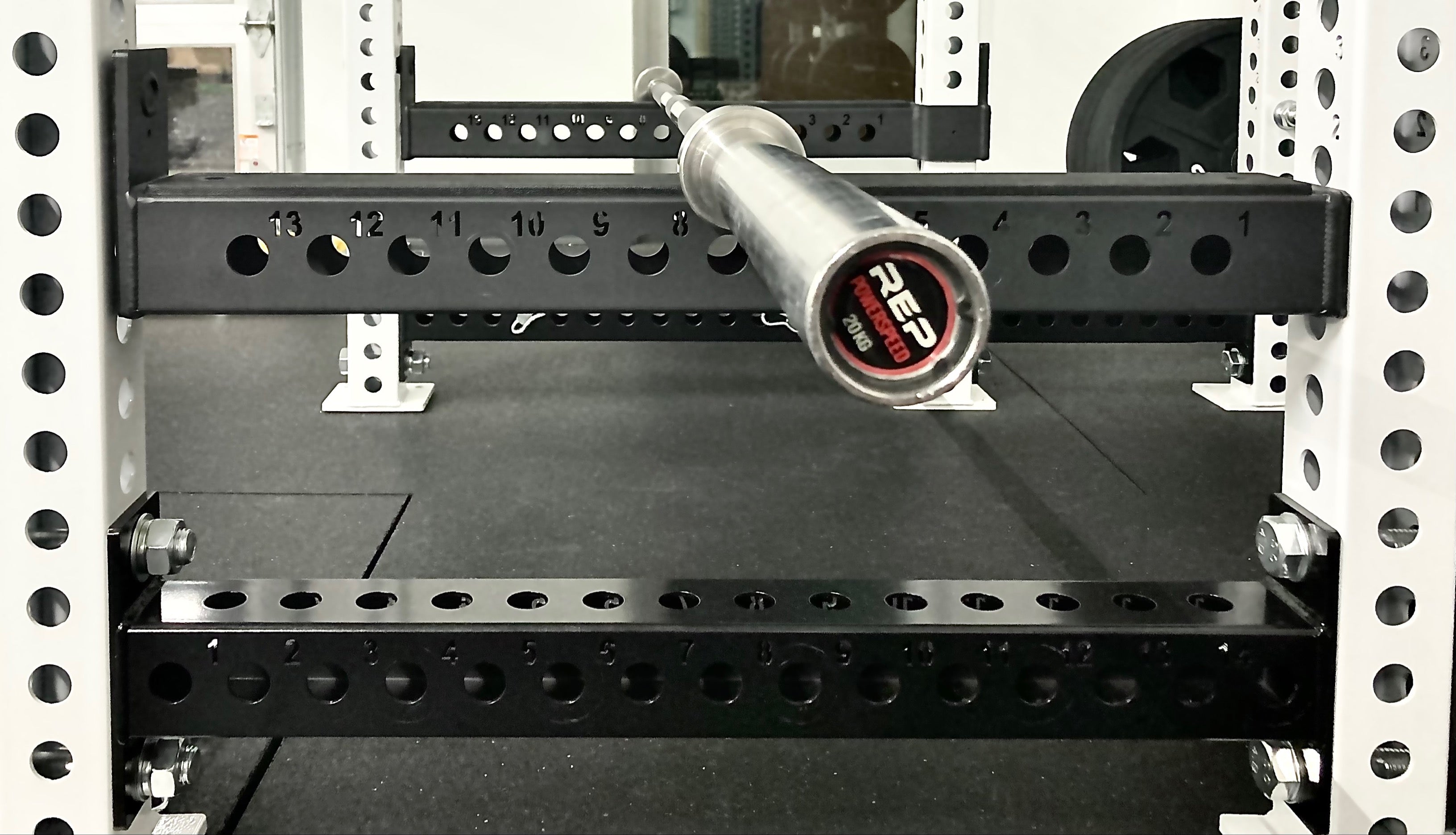 Flip-Down Safeties on PR-5000 Power Rack (Close Up of Side Holes and Laser Cut Numbering)