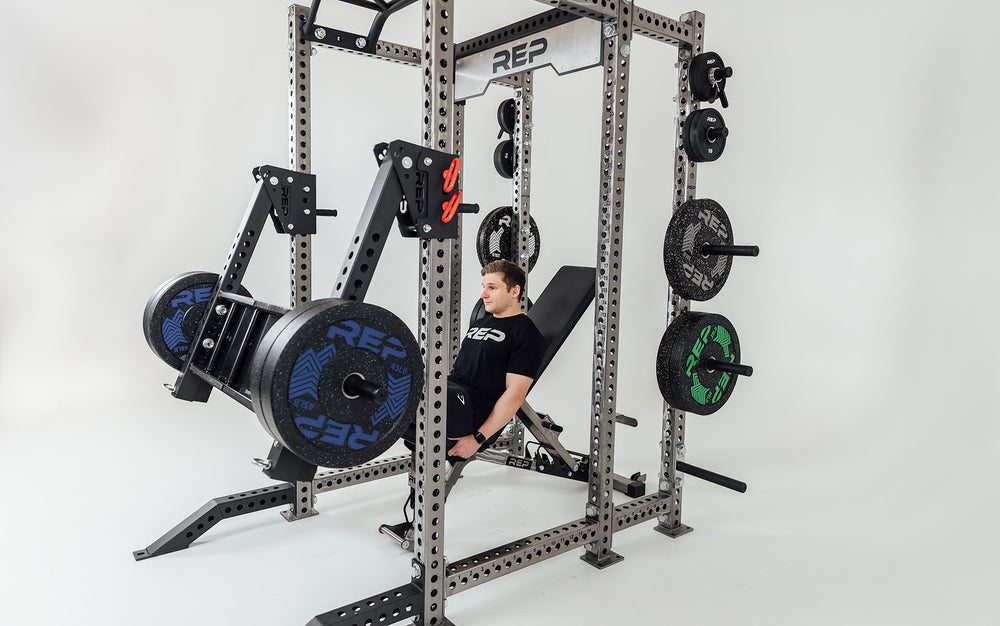 Utility Seat Installed on Iso Arms on Power Rack Being Used for Leg Press