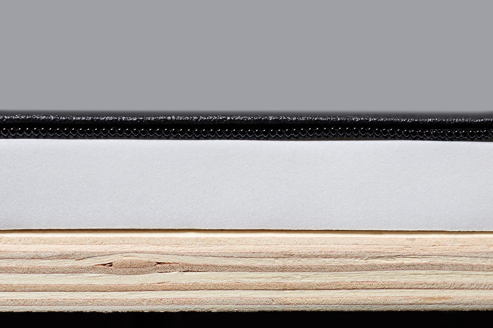 A graphic showing the layers of the REP 3-in-1 Soft Plyo Box: wood, soft foam, thick vinyl.