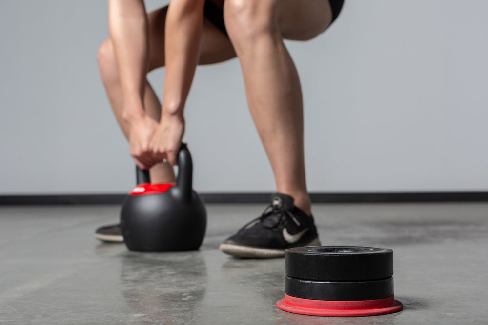 Exercising with the adjustable kettlebell