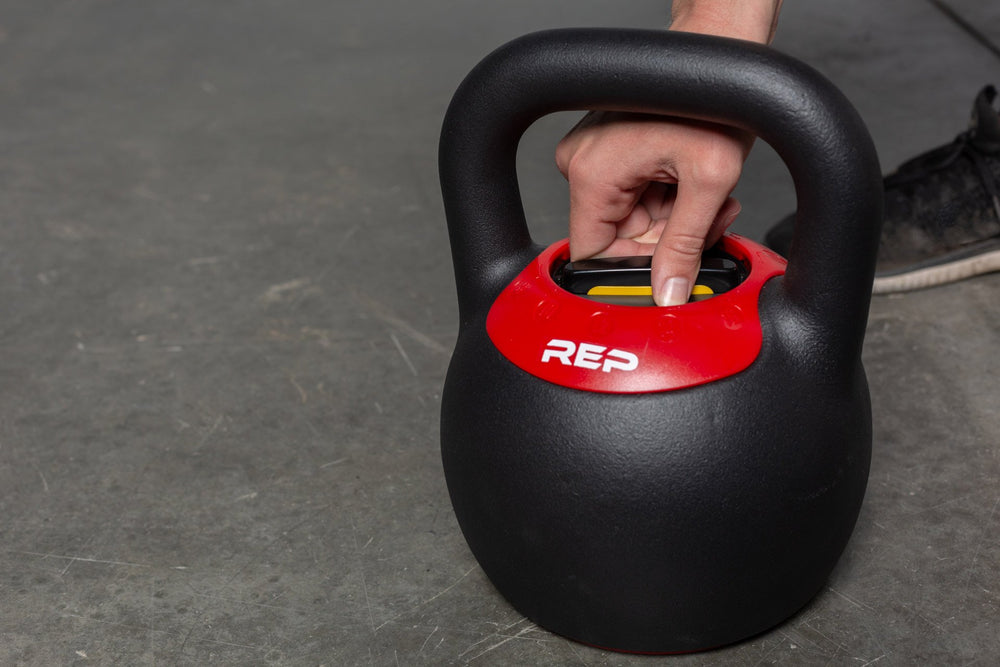 adjusting weights on the adjustable kettlebell