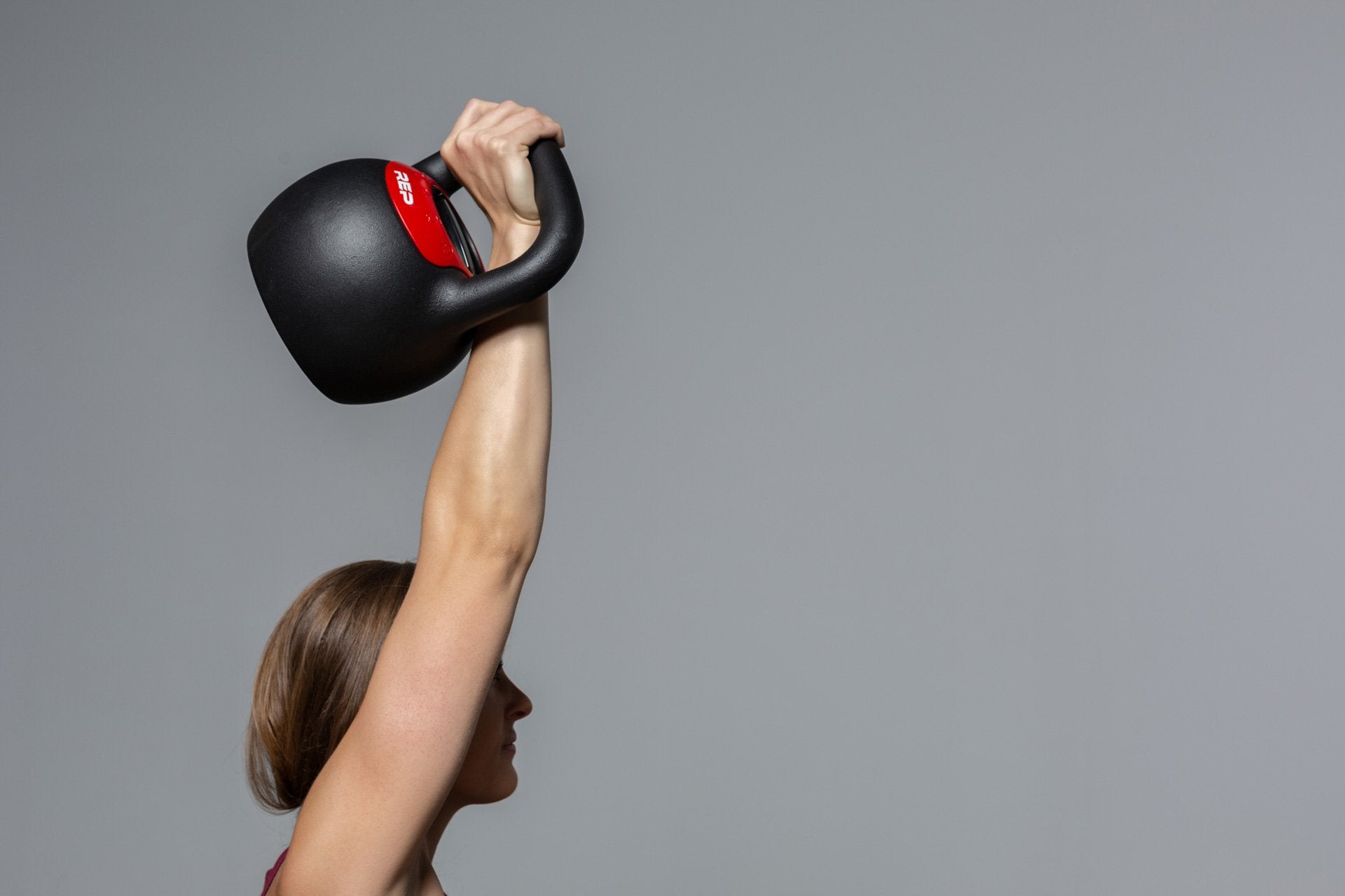 Exercising with the adjustable kettlebell