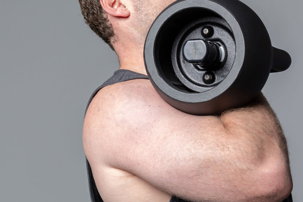 Exercising with the adjustable kettlebell