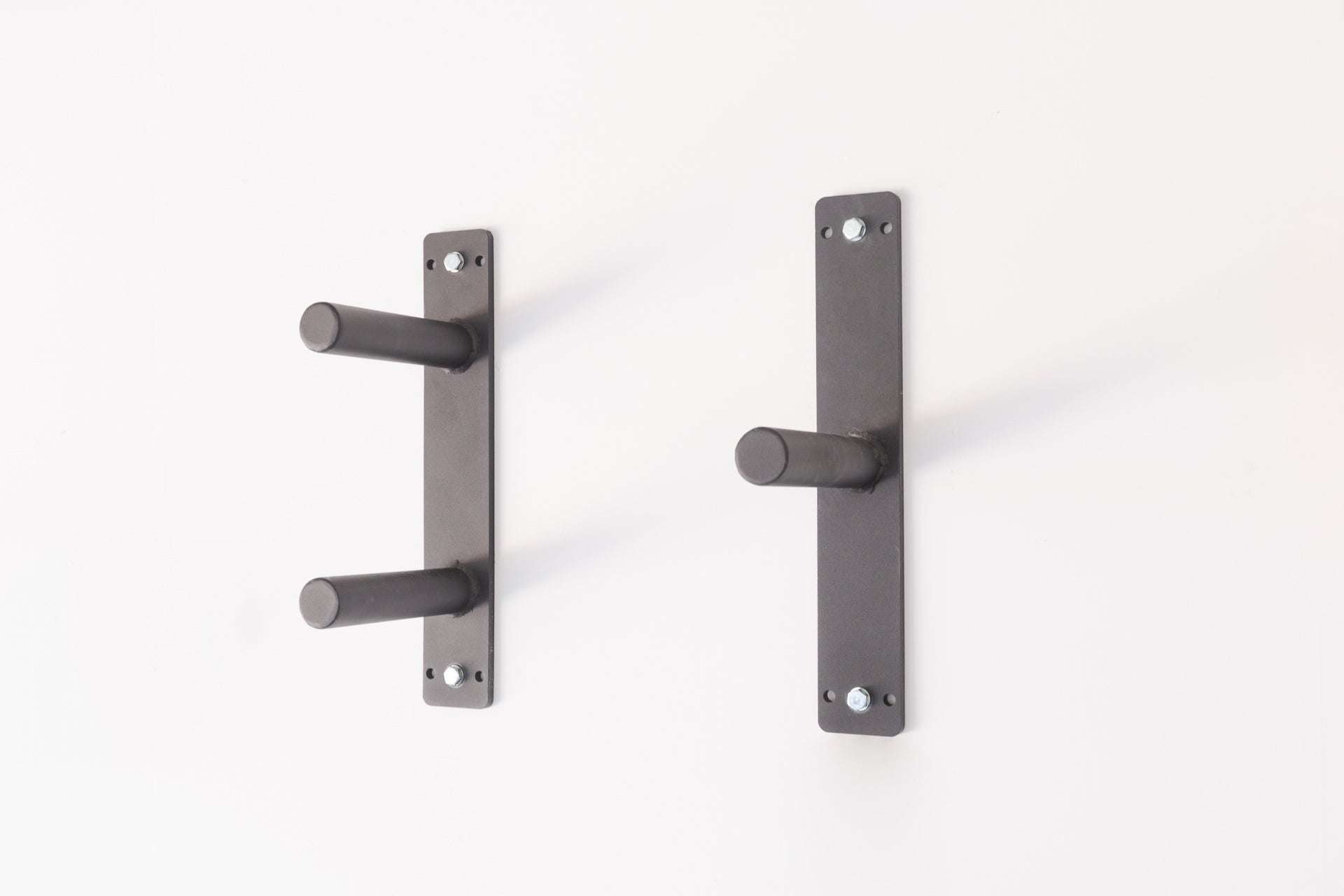 A single and double REP Wall Mounted Plate Storage attached to the wall.