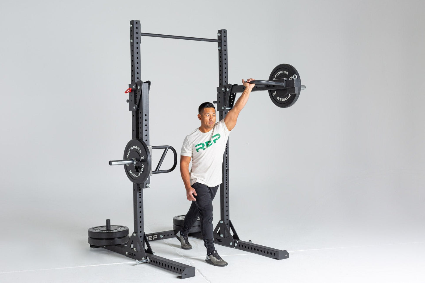 SR-4000 Squat Rack Shown With Iso Arms (In Use - Upper Body Press))