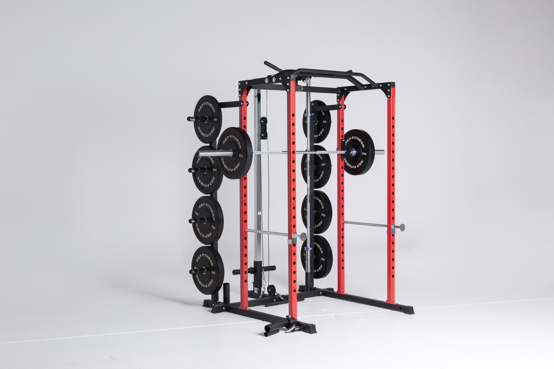 1000 Series Weight Storage on a PR-1100 Power Rack Holding Black Bumper Plates