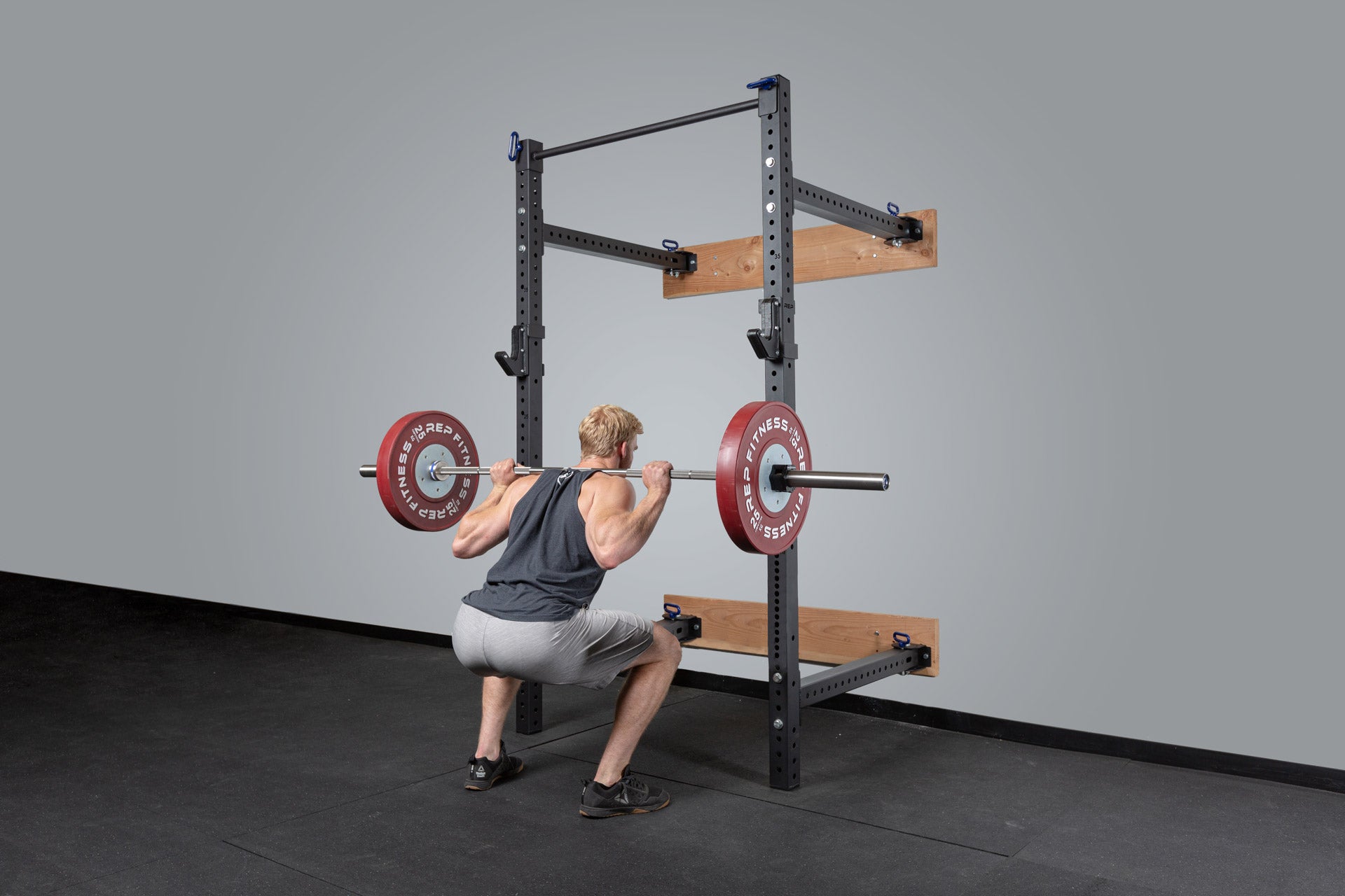 PR-4100 Folding Squat Rack In Use For Squats