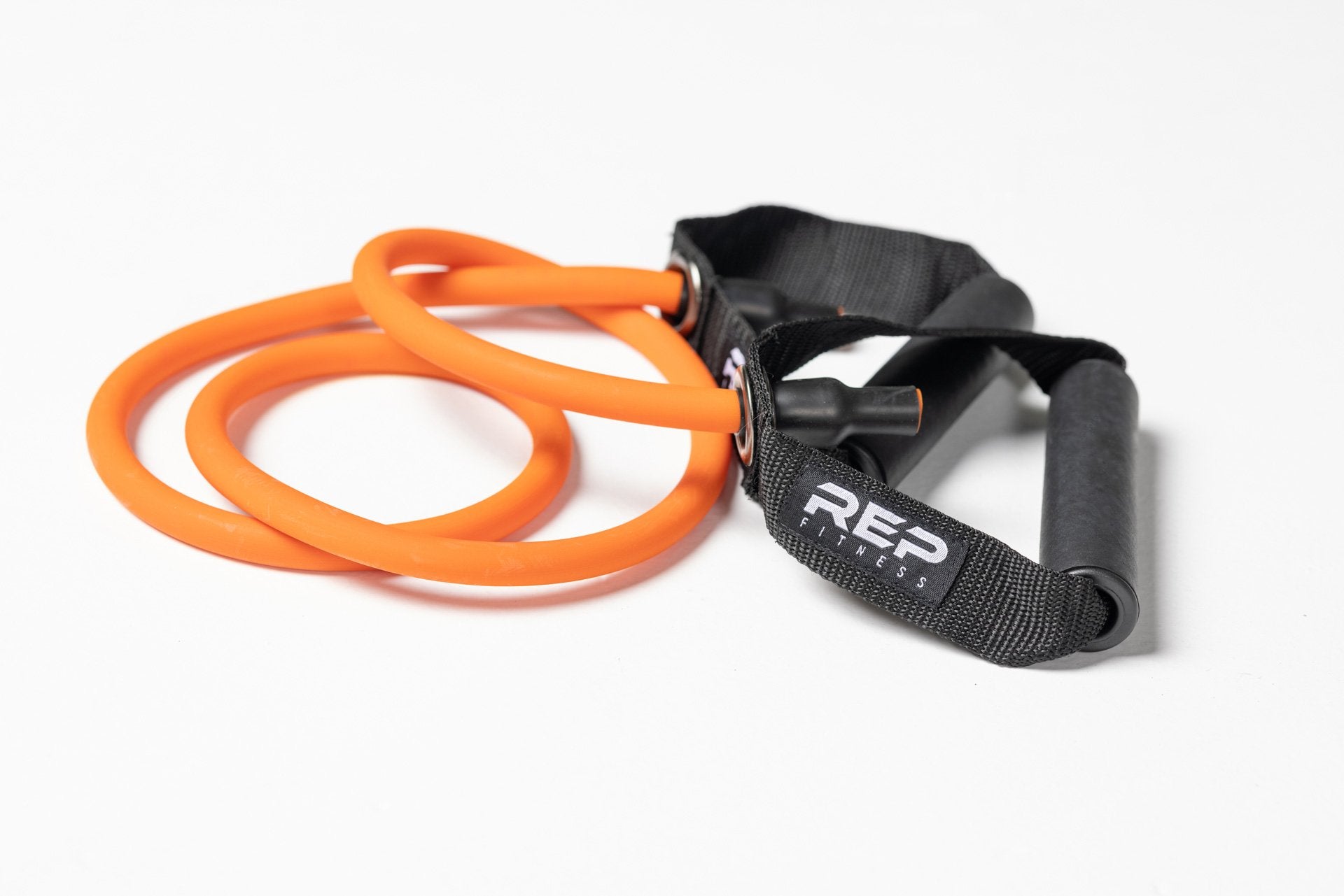 Orange medium resistance REP tube resistance band with handles.