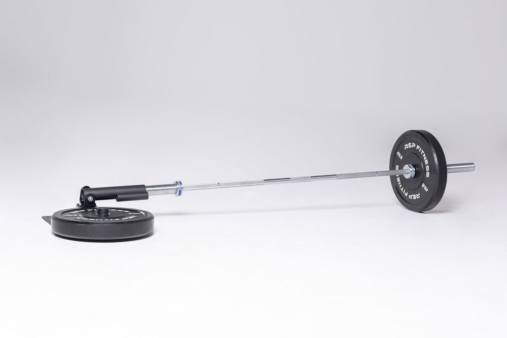 REP Free Standing Landmine with a loaded barbell in the sleeve and a 45lb REP bumper plate on the weight horn to keep the landmine in place.