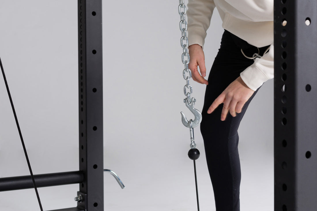 Cable Catch Connected to Belt Squat Attachment With Model In the Standing and Starting Position