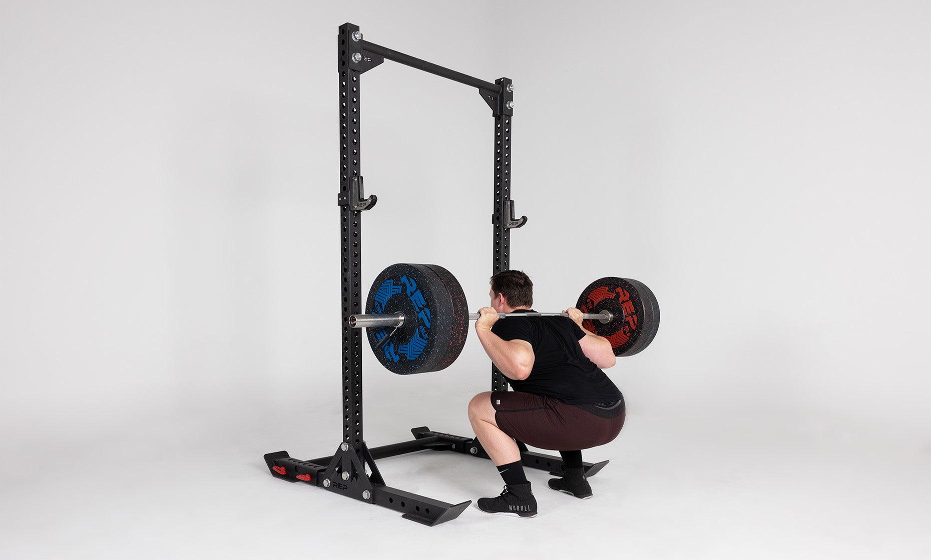 Oxylus Yoke with Pull-Up Bar Being Used As a Squat Rack